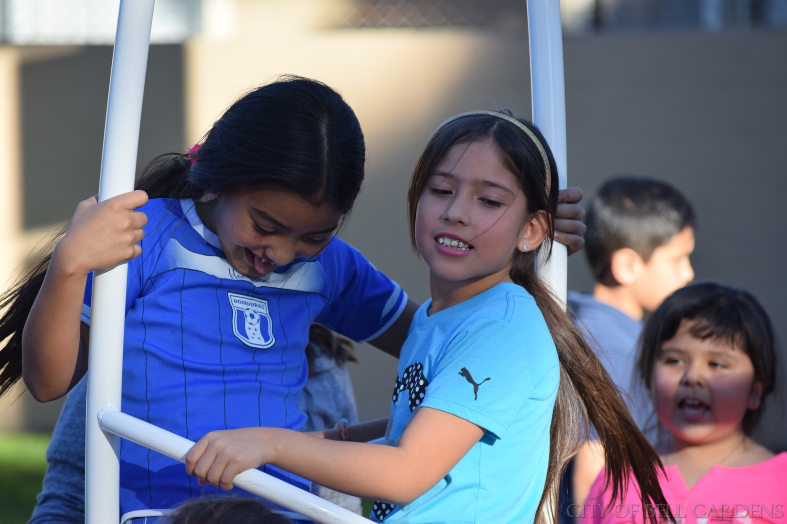 Kids enjoy the Xcelerator, GameTime's spinning playground equipment.